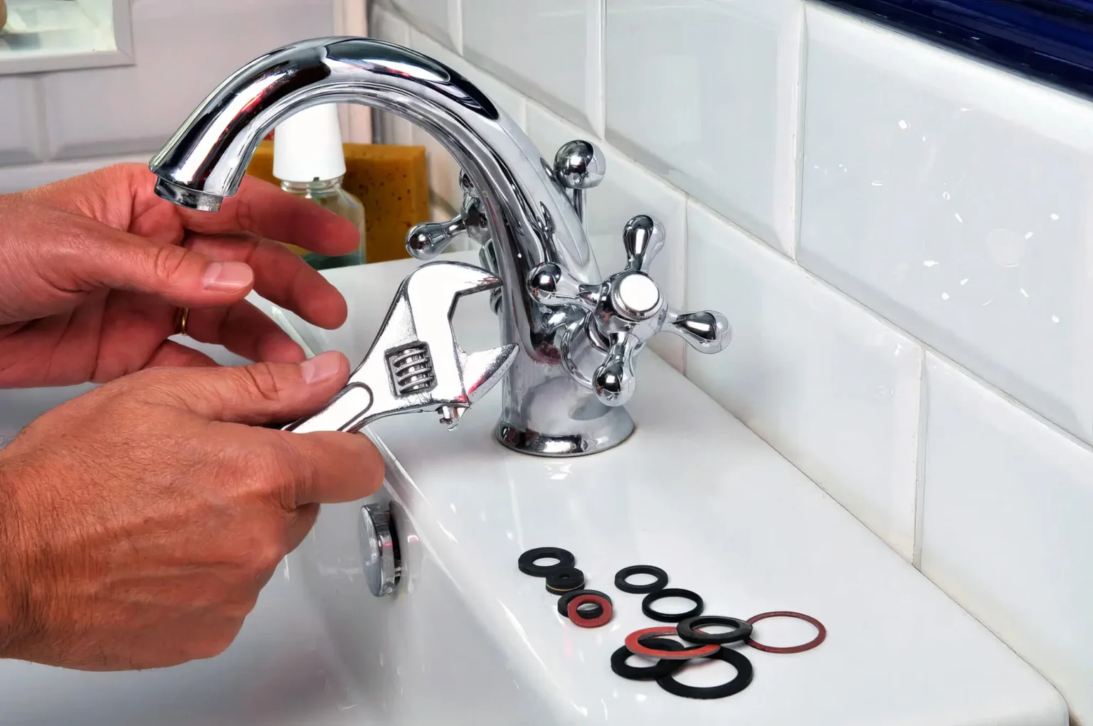 Plumber maintaining a bathroom faucet in Redwood City